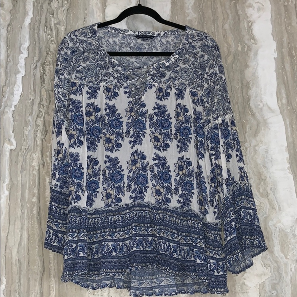 White and navy floral blouse